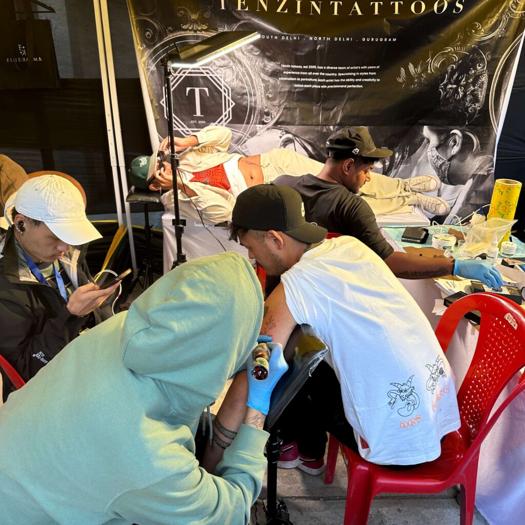 clients getting tattoos at tenzin tattoos shop