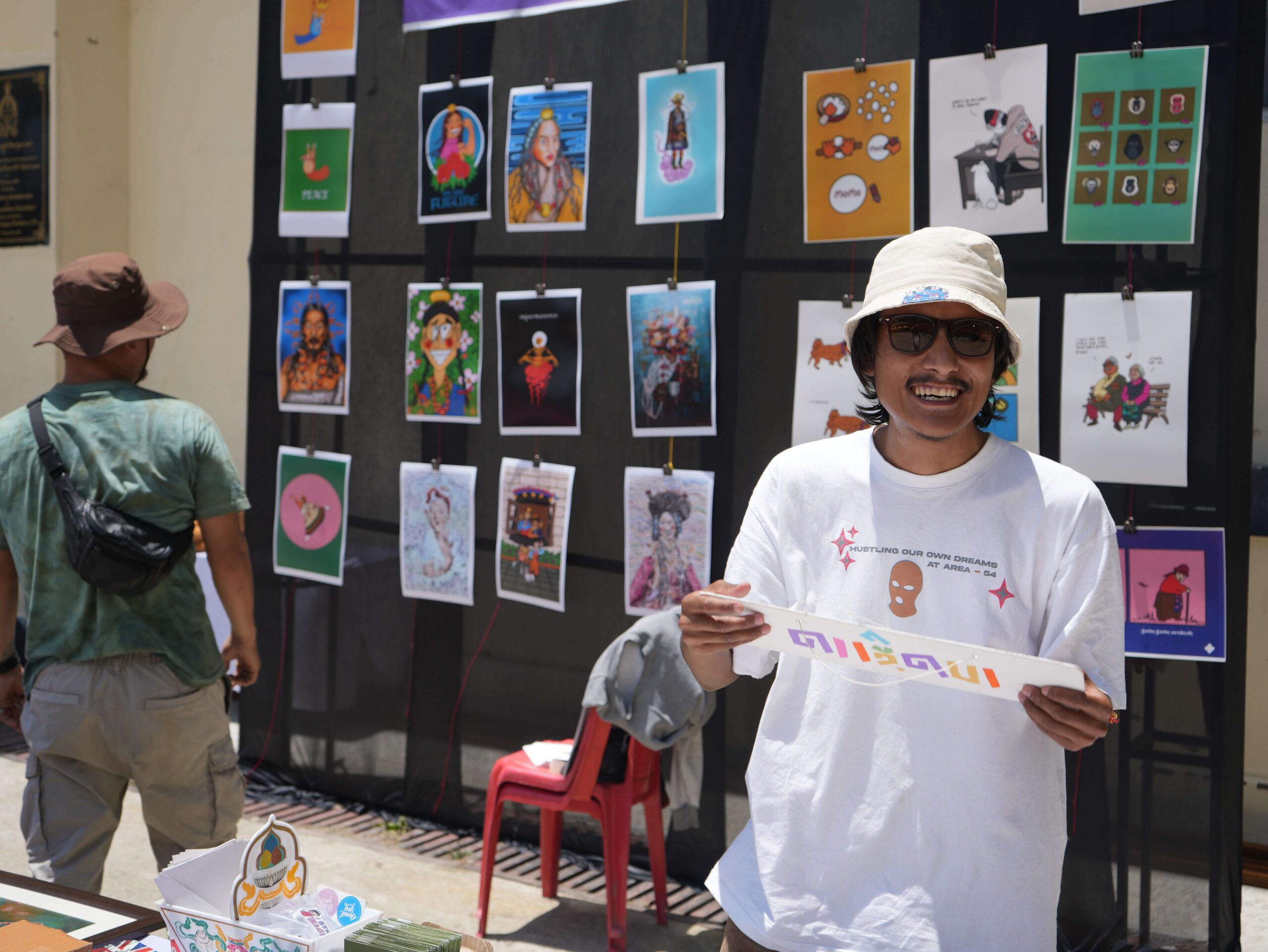 jc showcasing his art at pahari goat gallery